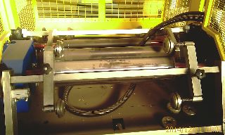 AD124 MACCHINA PER ROTOLI IN NYLON PVC IMBALLAGGIO MACHINE FOR NYLON ROLLS USED NOEL RIBO 500 SAT